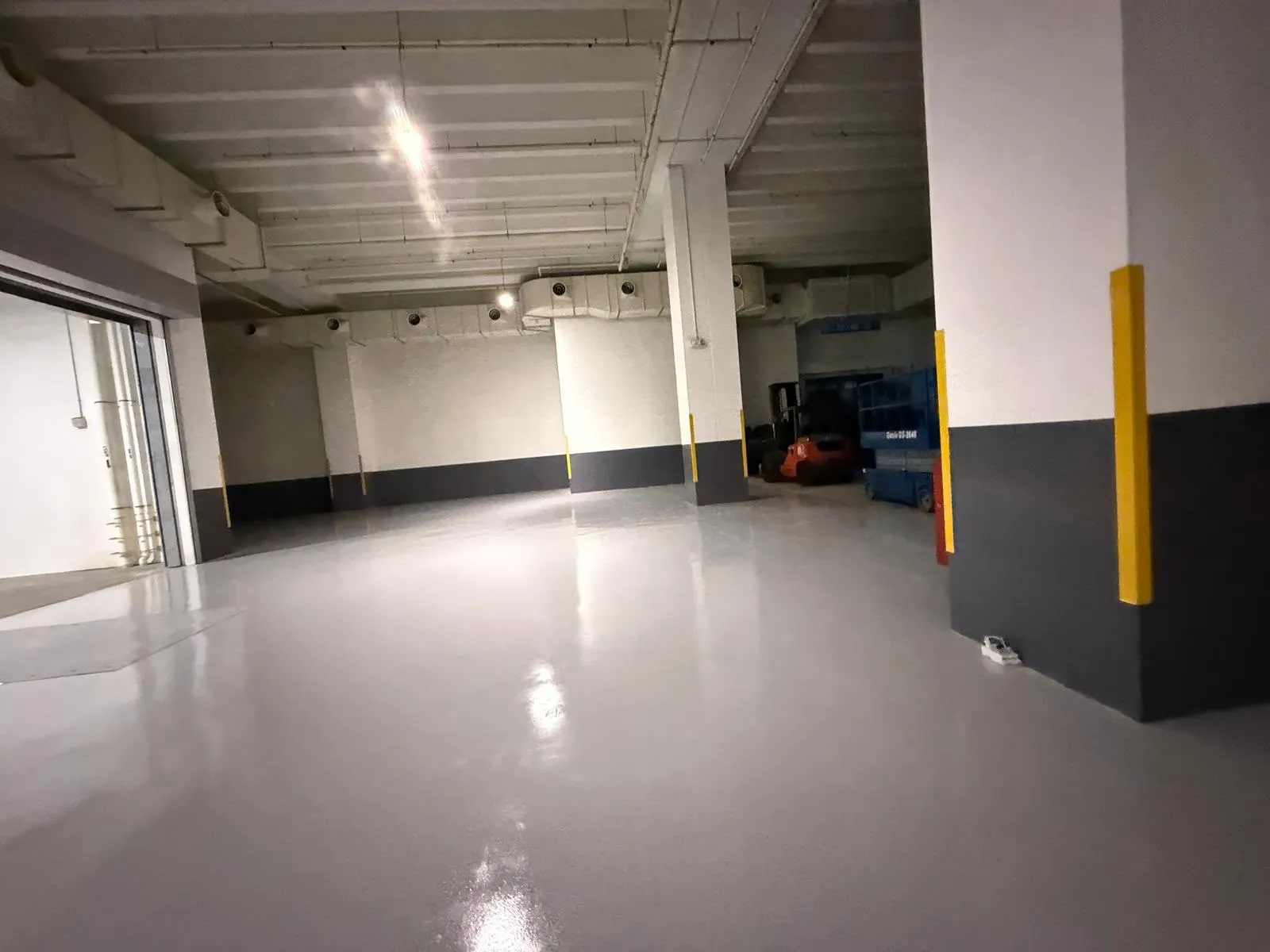 Hacking and stripping of damaged floor tiles and concrete screed bed